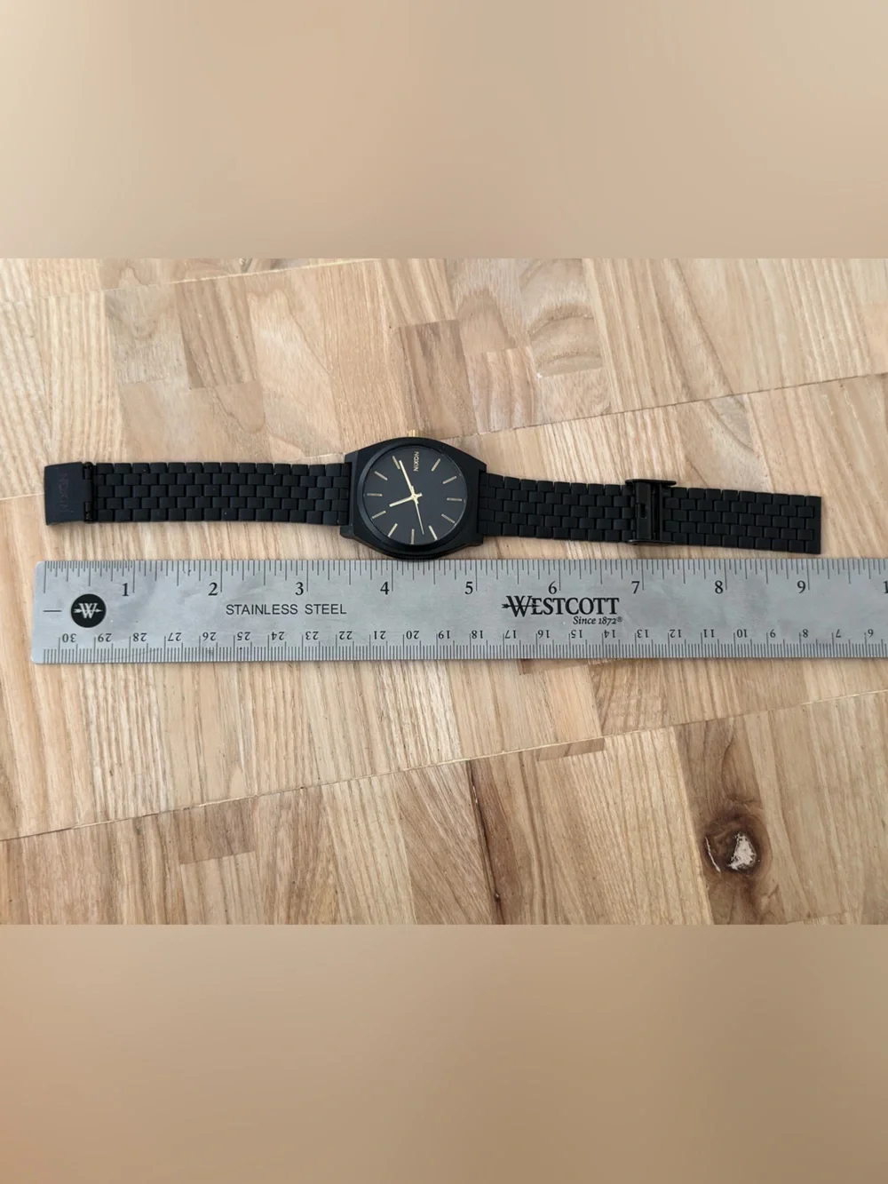 Nixon Minimal The Time Traveler Black Stainless Case Bracelet Gold Hands Markers